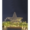 RiffelmacherMetal star standing on a natural wooden base 28x5x3cm 30x32cm gold 75233Article-No: 843965